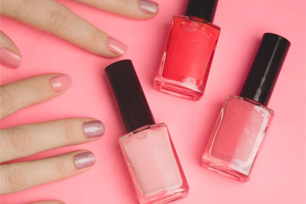 Nail polish in a woman 's hand . Gel polish. Nail care